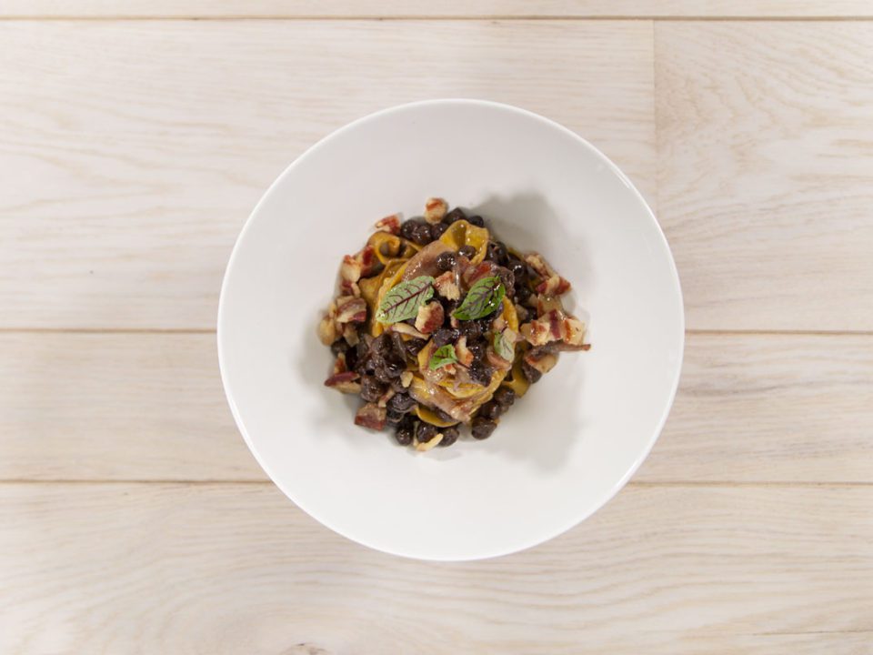 Tagliatelle with bacon, black chickpeas, and shallot
